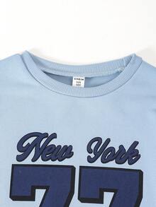SHEIN Explorewe Tween女孩 2件組街頭風套裝，淺藍色長袖上衣印有「New York」與「77」字樣，迷彩寬腿長褲，返校季秋季穿搭 - 藍色 - 查看 2