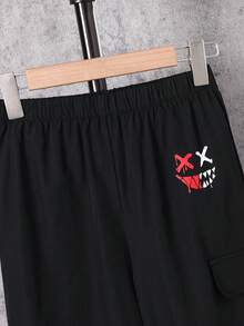 SHEIN Tween 男童休闲运动黑色印花贴袋宽松抽绳工装裤，适合通勤、上学、日常休闲、旅行、运动、春夏秋冬 - 黑色 - 查看 6