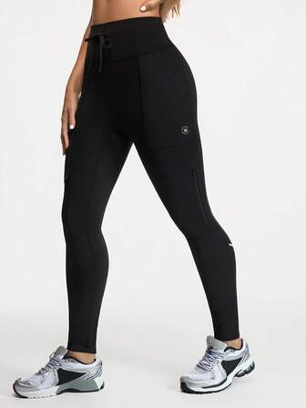 Exploreva Pantalones ajustados para deportes al aire libre de mujer con cordón en la cintura y bolsillos