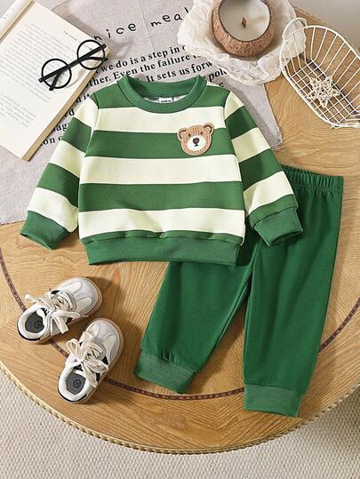 SHEIN 2pcs/Set Infant Toddler Baby Boy Spring/Autumn Colorblock Striped Crew Neck Long Sleeve Top With Cute Bear Graphic, Paired With Solid Blue Slim Fit Pants, Casual Outfit Suitable For Outings, Homewear, Light Sports, And Birthday Parties Green Outfit Toddler Green 2 Piece For Baby Boy Green Jogging Suit Baby Boy Green Gringham 12 18 Months Boy  Baby Boy Clothes Long Sleeve Baby Casual Sets Infant Boy Clothes With Bear Parties Baby Boy Striped Outfit Green And White Baby Boy Outfit