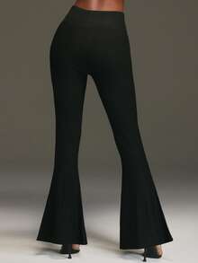 Pantalón NYA SZN - Pantalón negro acampanado de punto elástico de talle alto con hebilla para outfits de otoño e invierno para mujeres