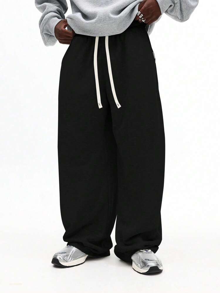 Calça de moletom com cordão e ajuste relaxado e cós elástico