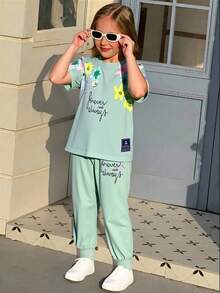 SHEIN Elladie kids Set de 2 piezas de camiseta y pantalones casuales con estampado floral para niñas jóvenes, adecuado para exteriores, deportes, primavera, verano, otoño