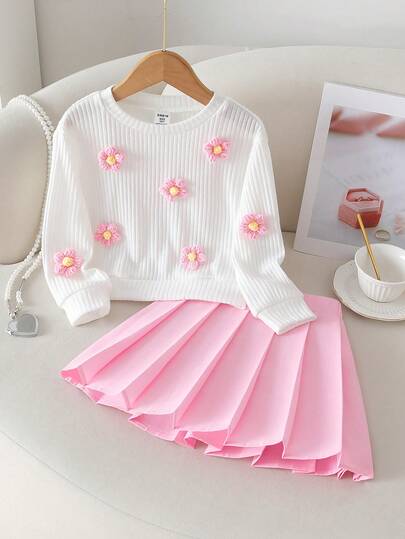 Suéter de punto con cuello redondo y decoración floral 3D para niñas preadolescentes, para primavera, otoño e invierno, con ajuste holgado y oversize, combinado con falda plisada rosa, estilo europeencia