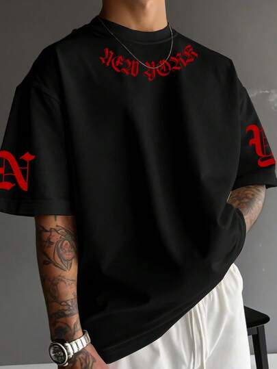 Manfinity EMRG Men's Casual Letter Graphic Loose Fit Round Neck Short Sleeve T-Shirt, Summer