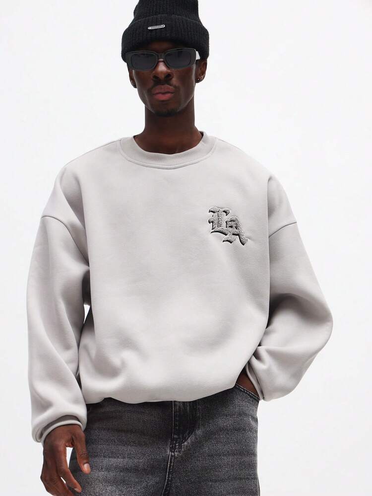Sweatshirt mit Rundhalsausschnitt und Applikationsdesign