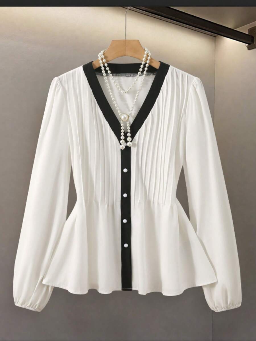 GlowEve Blusa de mujer con diseño de contraste blanco y negro, cuello en V y botones delanteros, elegante silueta de línea A que ciñe la cintura, ideal para maestras