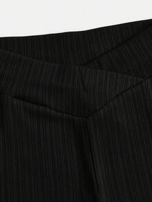 Leap Crew Tween Girls Spring Streetwear, Black Ribbed Solid Trousers, Cute High Waist Flared Pants, Comfortable Textured Fabric, High Stretch Black Flared Pants For Tween Girls