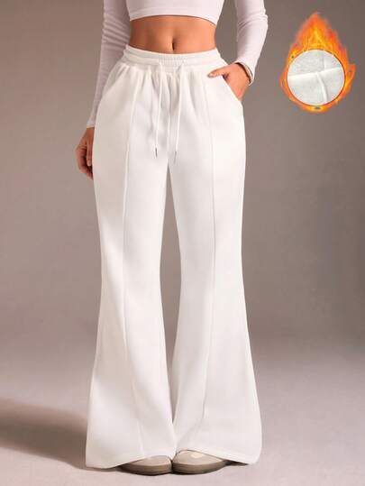 TRNVIE Pantalones de felpa con cintura elástica y cordón, de unicolor y acampanados para mujer