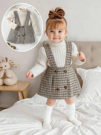 SHEIN 2pcs Baby Girl Warm & Cute Brushed Ribbed Turtleneck Romper And Plaid Suspender A-Line Skirt Set, Versatile For Autumn/Winter, Suitable For Outings, Vacations, Parties And More
