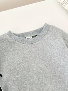 SHEIN 韩版休闲灰色卫衣，黑色蝴蝶结装饰，圆领设计，适合秋冬季穿着，舒适休闲，时尚百搭，适合户外活动、上学等场合，可爱又百搭。 - 灰色 - 查看 4
