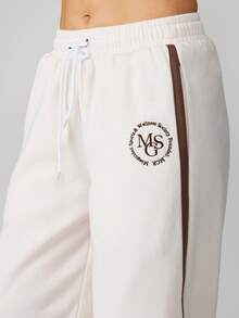 MISSGUIDED Pantalon de jogging à jambes larges avec détail de bande latérale contrastée, taille à cordon, pantalon de détente confortable