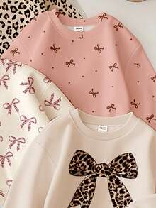 SHEIN Set de 4 sudaderas de cuello redondo gruesas, suaves y cómodas, aptas para uso diario en otoño/invierno, con estampados de: crema blanco, crema beige, crema rosa, estampado de leopardo crema, lazo de leopardo retro y mini lunares - Multicolor - Ver 3