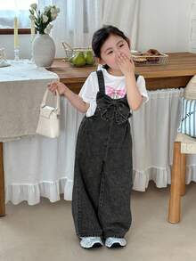 SHEIN 女童立体蝴蝶结蓝色牛仔宽松连体裤，适合春夏休闲度假乡村波西米亚风穿搭，也适合女童沙滩装、西部街头风、春假穿搭、锐舞派对装、节日牛仔连体裤，是年轻女孩度假的理想选择。 - 黑色 - 查看 6