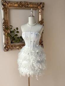 Lovelzi Elegant And Glamorous White Stretch Knit Dress, Adorned With Handcrafted 3D Floral Feathers And Rhinestone Embellishments. The Strapless Bodice And Multi-Ribbed, Slimming Bubble Skirt Create A Flattering Silhouette, Making It Suitable For Weddings, Formal Occasions, And Gift Parties. (Exquisite Craftsmanship) - White - View 2