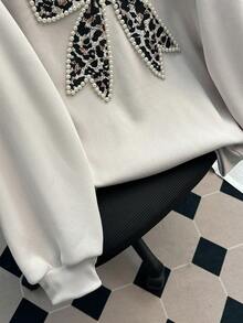 Resyla Women's Winter American Style Autumn/Winter Printed Rhinestone Crew Neck Sweatshirt With Butterfly Design, Versatile Loose Fit, Leopard Print Top.