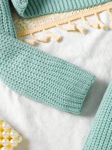 1件春秋纯色圆领珍珠针织无袖连衣裙搭配短款V领串珠蝴蝶结长袖毛衣，常规厚度，休闲日常穿着，适合聚会、逛街等场合