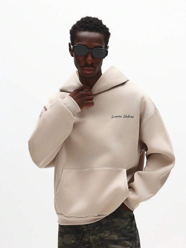 Sweat à capuche avec cordon de serrage et imprimé script
