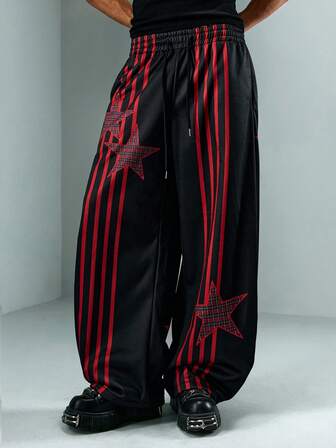 Pantaloni della tuta casual larghi da uomo con vita con coulisse e stampa a stelle a cinque punte a righe