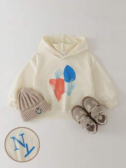 THE HAPPY LOOK 少女几何图案米色宽松卫衣，基础休闲风格