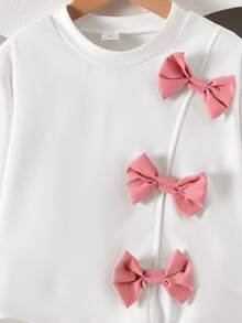 2pcs Set: Bow Decor Khaki Long Sleeve Sweatshirt & Black Pleated Mini Skirt - Pink - View 7