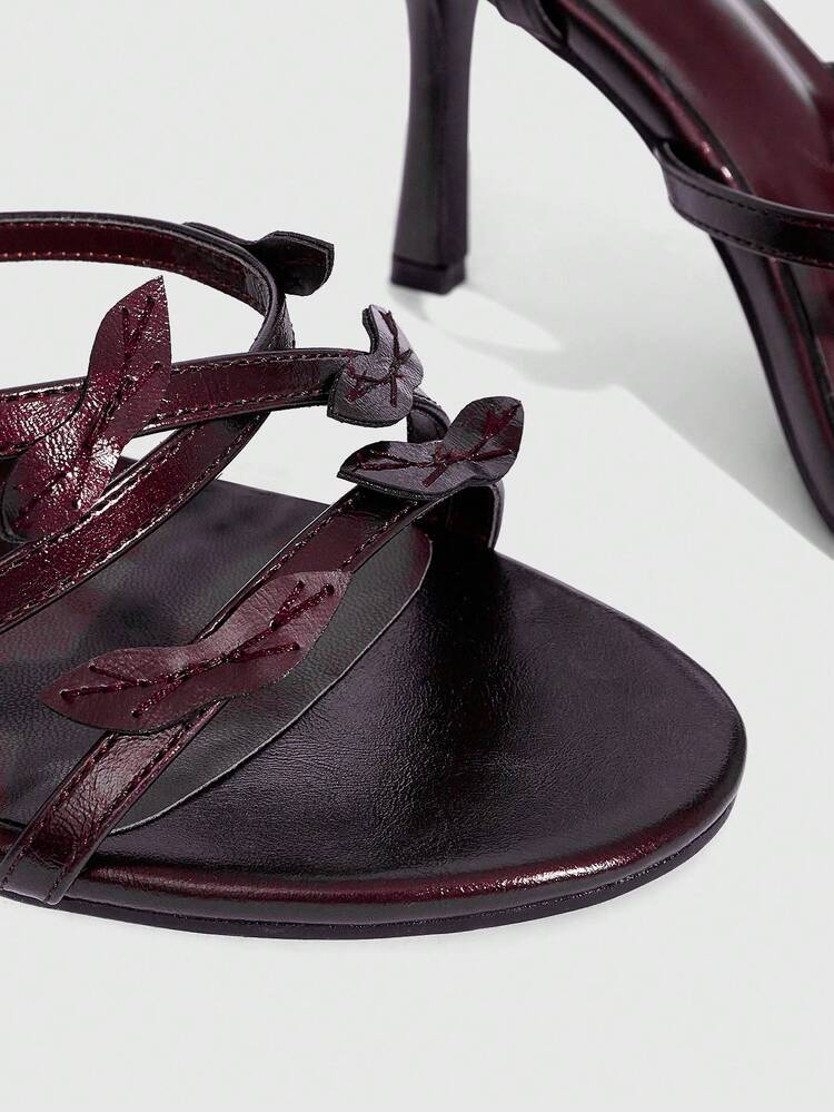 CUCCOO SZL Women's Gold Metallic PU Strap Asymmetrical Leaf Decor Fashionable Sexy Glamorous Metallic Nightclub Style Round Toe High Heel Sandals