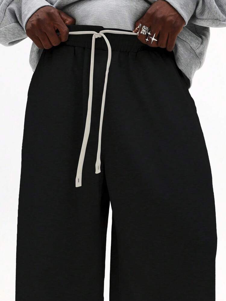 Calça de moletom com cordão e ajuste relaxado e cós elástico