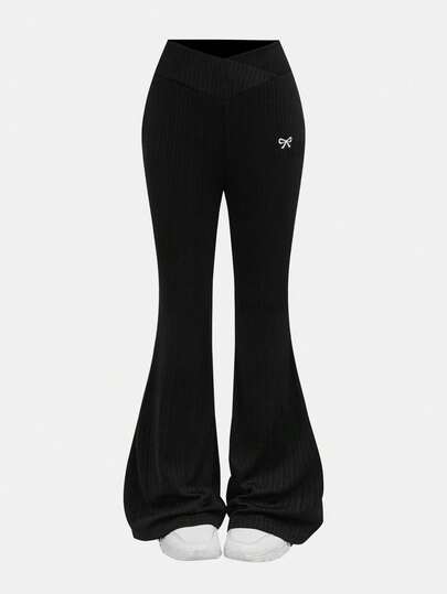Leap Crew Tween Girls Spring Streetwear, Black Ribbed Solid Trousers, Cute High Waist Flared Pants, Comfortable Textured Fabric, High Stretch Black Flared Pants For Tween Girls