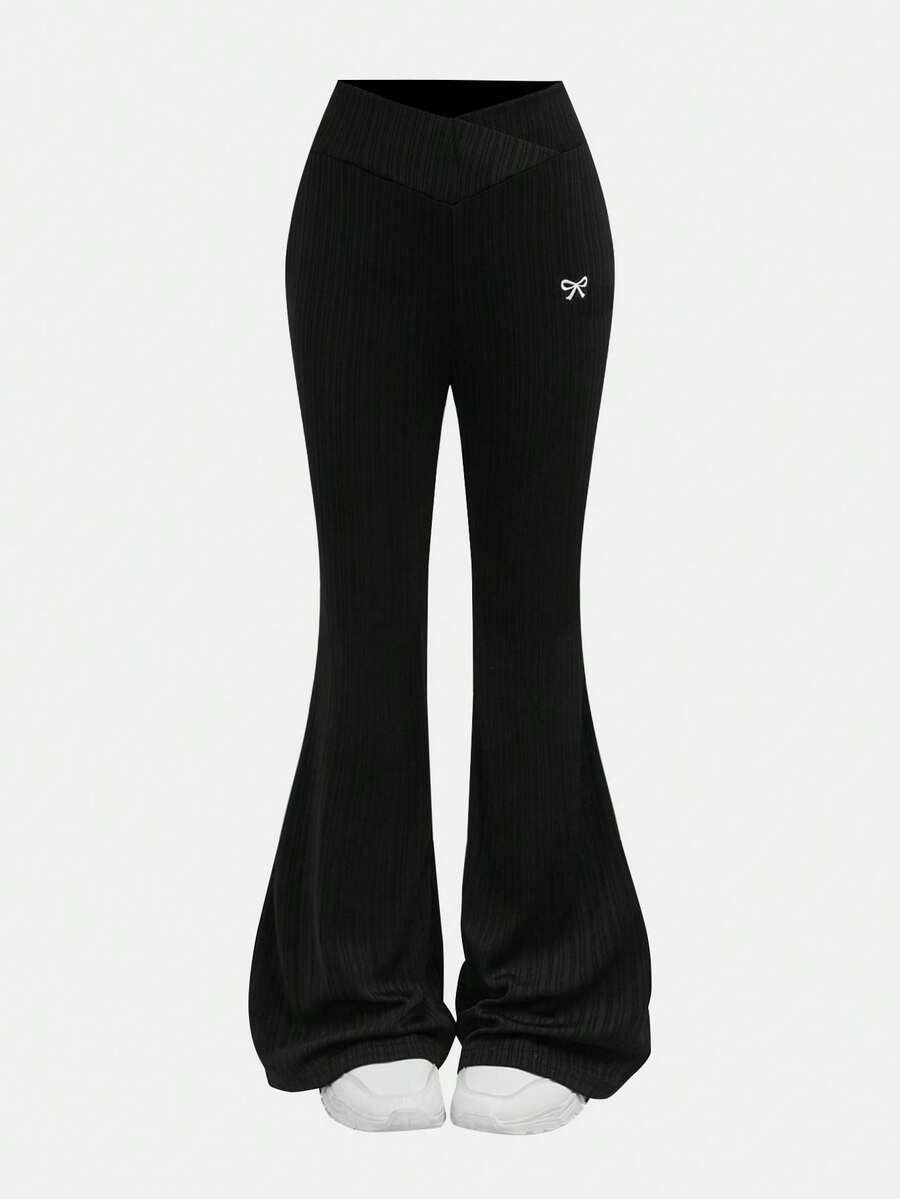 Leap Crew Tween Girls Spring Streetwear, Black Ribbed Solid Trousers, Cute High Waist Flared Pants, Comfortable Textured Fabric, High Stretch Black Flared Pants For Tween Girls