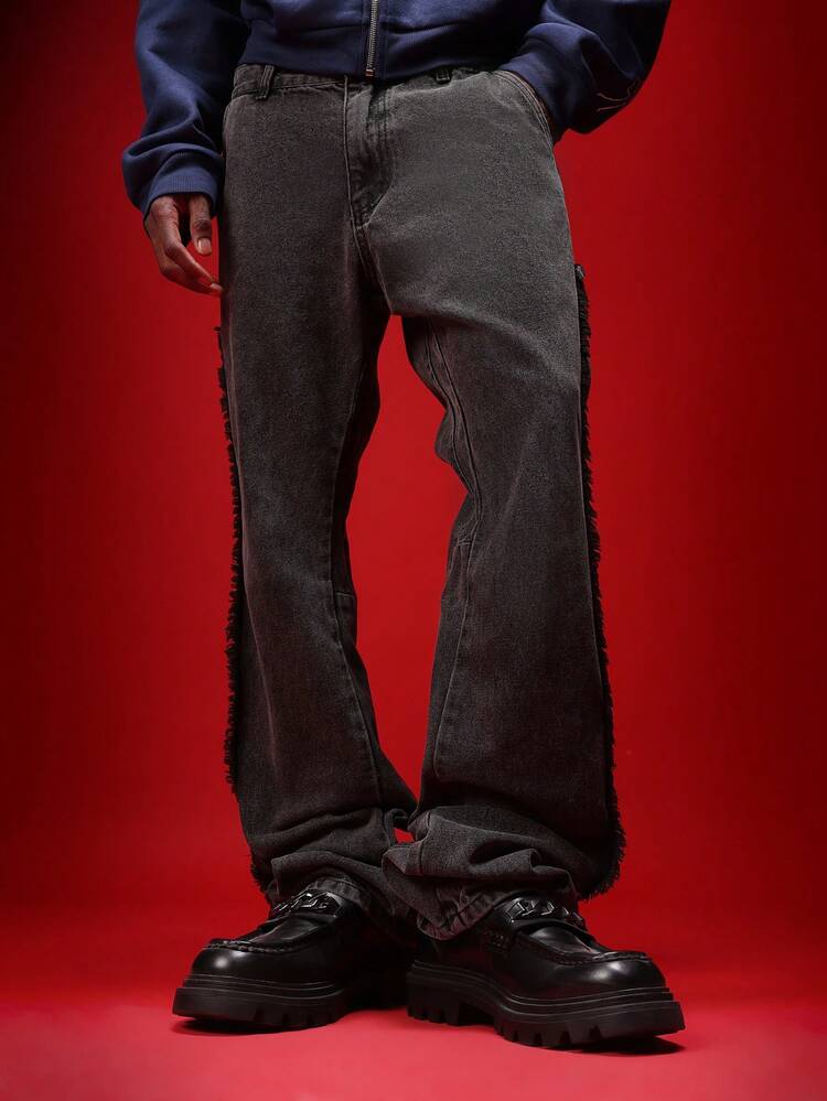 Jean évasé en denim avec délavage vintage