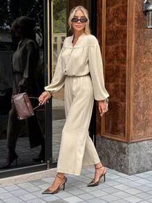 SHEIN Frenchy Autumn Fall Clothes For Women 2025 New Elegant Women's Elegant Commuter Solid Color Lantern Sleeve Jumpsuit,Office Commute Work Streetwear, Suitable For Party Wedding Graduation, Classic Chic Old Money Style Outfit Winter,All-Season,Thanksgiving Outfit For Women,New Year  Jumpsuit ,Casual Jumpsuit  ,Autumn Jumpsuit, Jumpsuit   Suitable For Party, Halloween, Christmas, Holiday Events Boho Jumpsuit ,Holiday Outfits For Women - Apricot - View 1