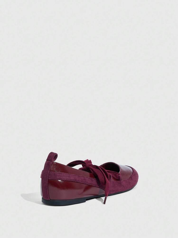 MISSGUIDED Ballerines en cuir verni et daim à lacets