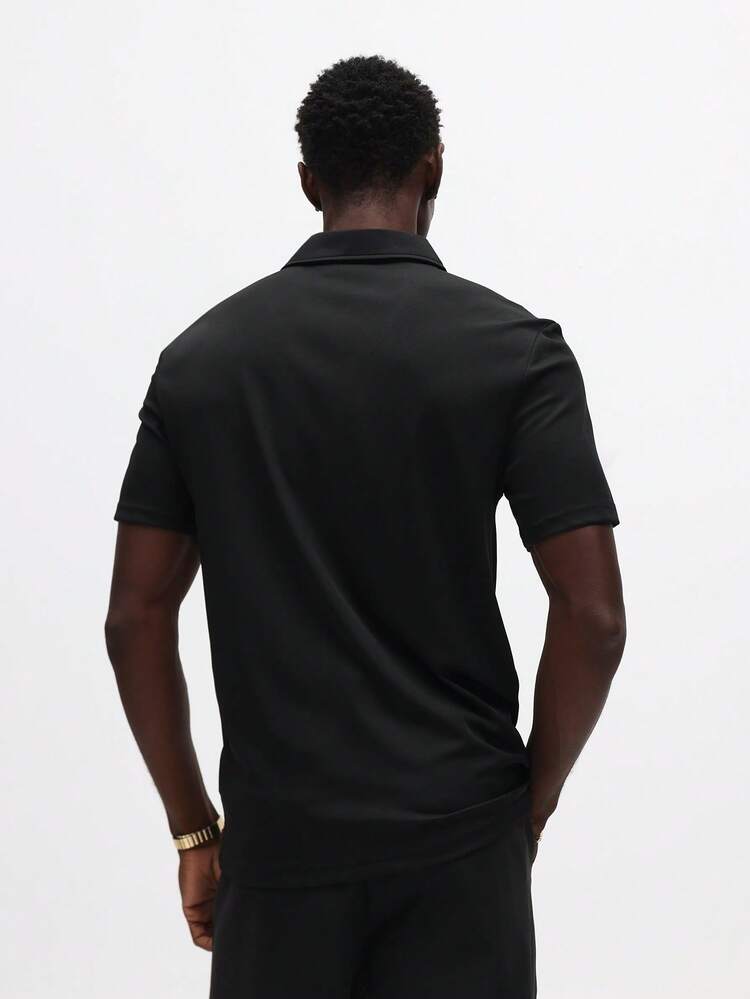 Muscle Fit Polo Shirt With Quarter Zip