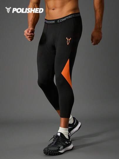 Manfinity Sport Polished Leggings deportivos de cintura baja con parches de color contrastante para hombres