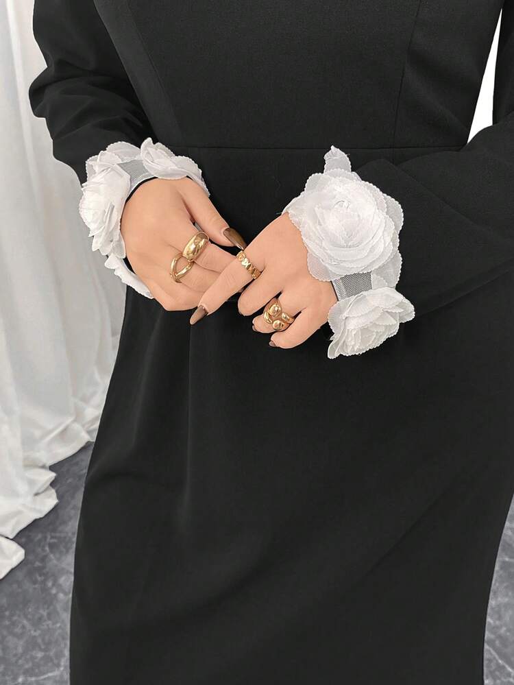 Modelyn فستان بياقة مرتفعة وأكمام منتفخة باللون الأسود، مزين بأزهار على الأساور، فستان ذو تنورة ضيقة على شكل ذيل الحوت للمناسبات الرسمية والحفلات - الأسود - مشاهدة 3