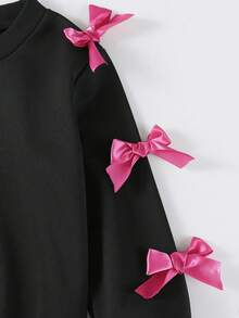 SHEIN Elladie kids 2 件套女童甜美酷炫蝴蝶结装饰黑色上衣 + 紫红色喇叭裤套装，黑色上衣搭配多个粉色蝴蝶结，紫红色喇叭裤搭配时尚廓形，甜美酷炫风格适合返校、郊游、街头穿着 - 彩色 - 查看 7