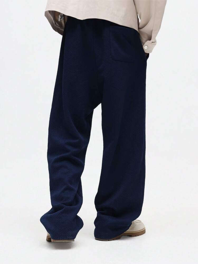 Calça de moletom geométrica texturizada de corte reto