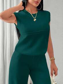 EURMUSE Two Pieces Sleeveless Knit Set Featuring Minimalist Crew Neck Top And High-Waisted Ribbed Pants In Soft Ivory - Dark Green - View 4