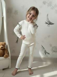 SHEIN Conjunto de suéter de manga larga y pantalones de ajuste holgado para niñas, suéter de punto con dobladillo con volantes y pantalones, cómodo para uso casual, adecuado para otoño/invierno - Albaricoque - Ver 7