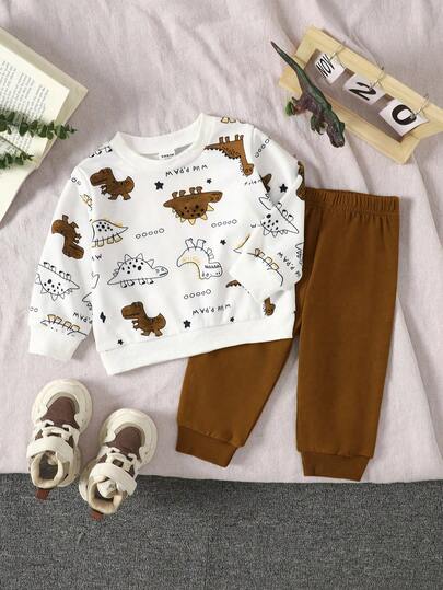 SHEIN Set de 2 piezas de parte superior de manga larga con cuello redondo con estampado de dinosaurio y pantalones verdes lisos para bebé niño, adecuado para juegos al aire libre, uso casual y deportivo, primavera/otoño