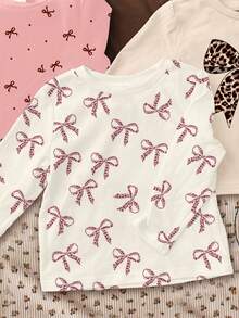 SHEIN Bộ 4 chiếc/Bộ màu trắng kem, kem be, kem hồng, nơ da báo cổ điển, nơ chấm bi mini họa tiết thường ngày, áo thun dài tay ấm áp cổ tròn, thích hợp mặc hàng ngày vào mùa thu/đông, thoải mái dễ chịu, nhiều lớp áo mùa thu & đông cho bé gái, trẻ em sành điệu, trang phục thường ngày, áo thun họa tiết nơ trẻ em, quần áo mùa thu & đông, mùa thu sang trọng, thời trang mùa đông, phong cách mới - Nhiều màu - Xem 8