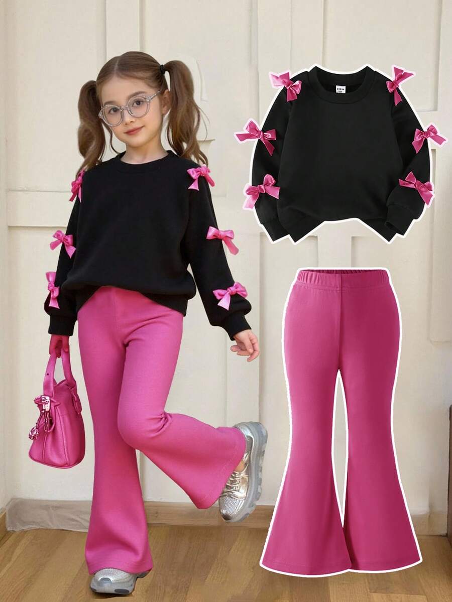 SHEIN Elladie kids 2 件套女童甜美酷炫蝴蝶结装饰黑色上衣 + 紫红色喇叭裤套装，黑色上衣搭配多个粉色蝴蝶结，紫红色喇叭裤搭配时尚廓形，甜美酷炫风格适合返校、郊游、街头穿着 - 彩色 - 查看 1