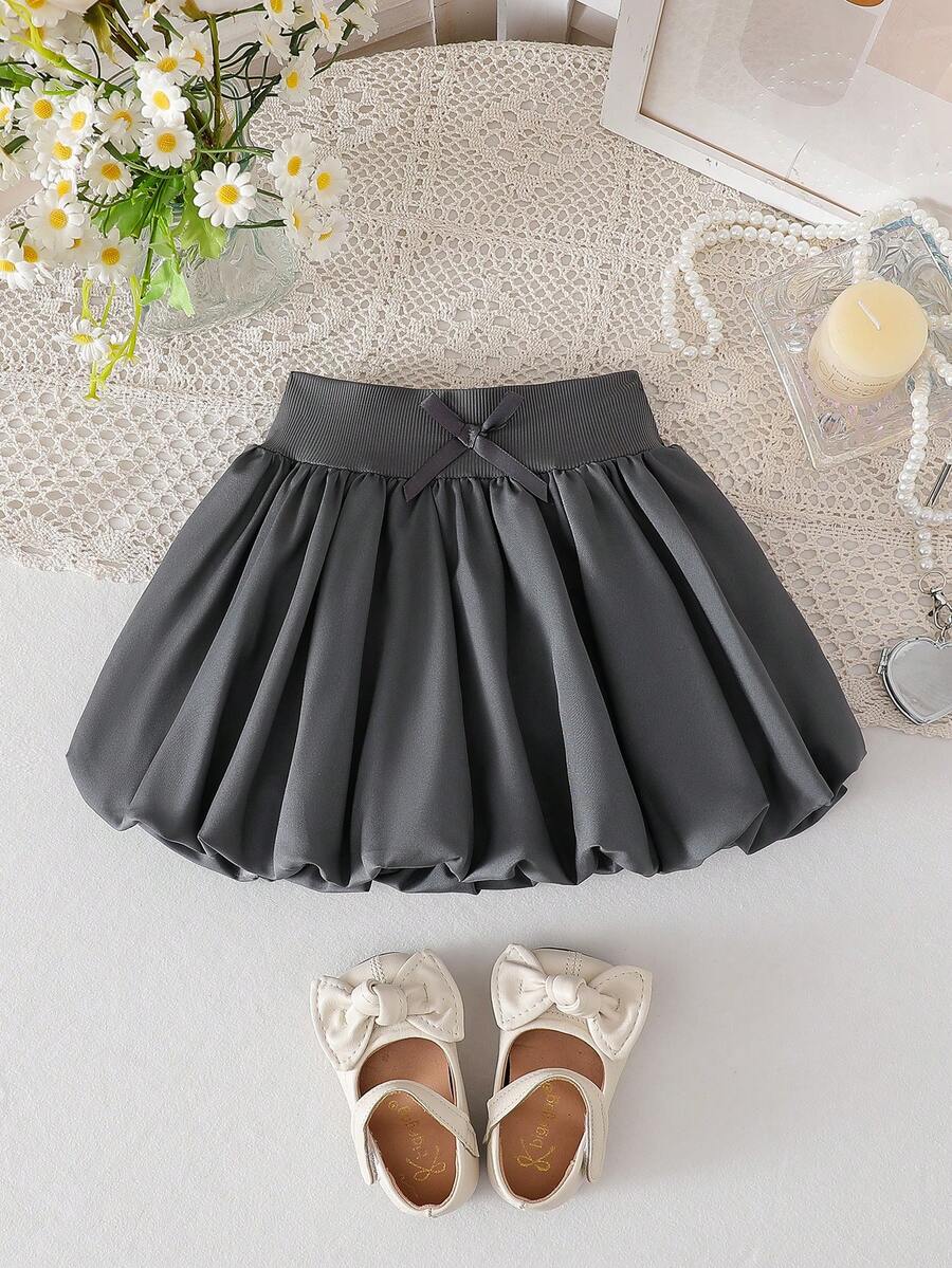 SHEIN Elladie kids 女婴纯色A字泡泡裙。纯色展现优雅格调，泡泡设计更添可爱气息。A字廓形修饰身材，适合各种体型的宝宝。无论是外出玩耍、居家休闲、日常活动，还是出席特殊场合，这款裙子都能让您的小公主散发独特魅力，享受快乐时光。 - 深灰色 - 查看 1