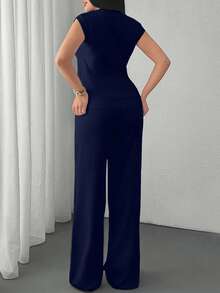 EURMUSE Two Pieces Sleeveless Knit Set Featuring Minimalist Crew Neck Top And High-Waisted Ribbed Pants In Soft Ivory - Navy Blue - View 2