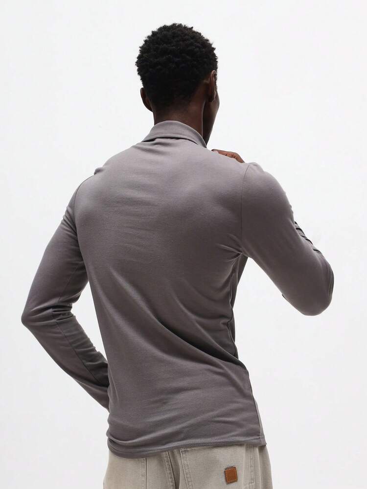 Camisa polo de manga comprida com ajuste muscular