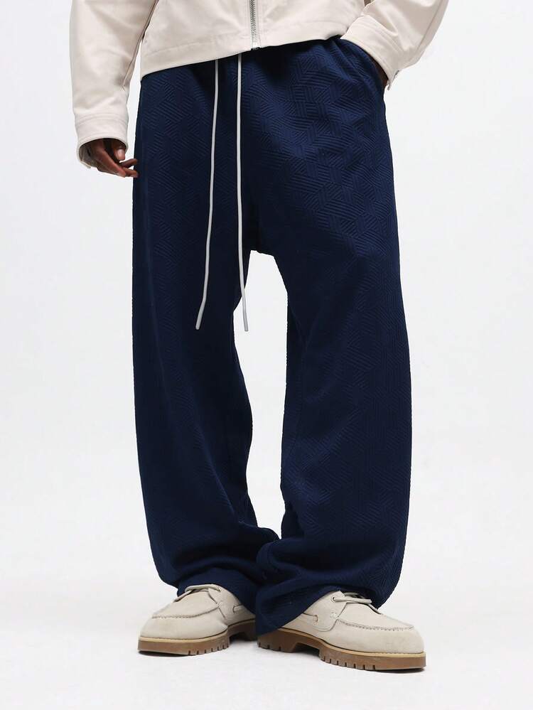 Calça de moletom geométrica texturizada de corte reto
