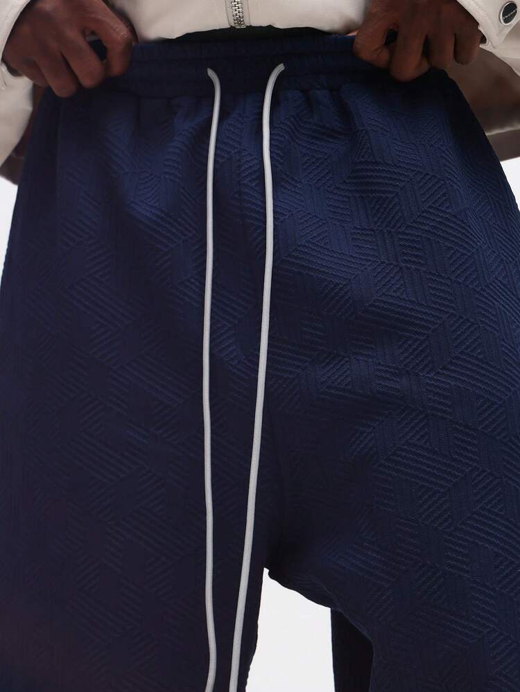 Calça de moletom geométrica texturizada de corte reto