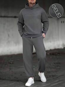 Manfinity CasualCool 男士纯色落肩长袖休闲宽松多功能连帽衫套装 Katseye 男士运动套装 男士健身服 男士慢跑套装 街头风男士喇叭运动裤 Old Money 风格，适合日常休闲、周末旅行、户外活动、探险旅行、轻松的工作环境或半正式场合，也是送给男友/丈夫的礼物、周年纪念礼物和圣诞节服装的理想之选。 - 深灰色 - 查看 3