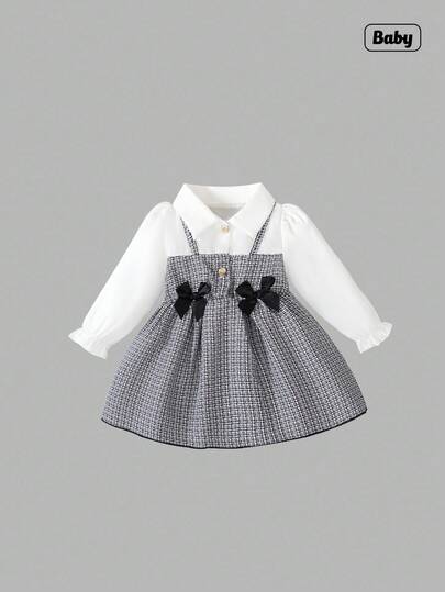 Sweetra 女婴领泡泡袖二合一A字裙。经典A字廓形，适合各种体型的宝宝。独特的领口设计增添一丝半正式感，巧妙的泡泡袖设计则甜美俏皮。二合一设计营造视觉深度。无论居家还是休闲，这款连衣裙都能展现宝宝活泼可爱的天性。