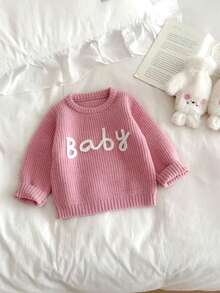 SHEIN Vintaside Kids 女婴刺绣粉色套头毛衣，适合春秋季穿着，冬季也可作为内搭。精致的刺绣更添可爱俏皮的魅力。适合家庭聚会、万圣节、新年、感恩节、圣诞节、复活节、国庆节、派对、除夕等场合。婴儿针织衫、婴儿毛衣、秋冬季女婴套头衫、女婴毛衣、婴儿服装、女童秋季毛衣、婴儿长袖上衣、婴儿服装、黑色婴儿上衣、幼儿上衣、婴儿服装、女童秋季毛衣、婴儿纯色针织毛衣、粉色婴儿毛衣、婴儿粉色毛衣、婴儿针织毛衣、婴儿套头衫。 - 藕粉色 - 查看 5